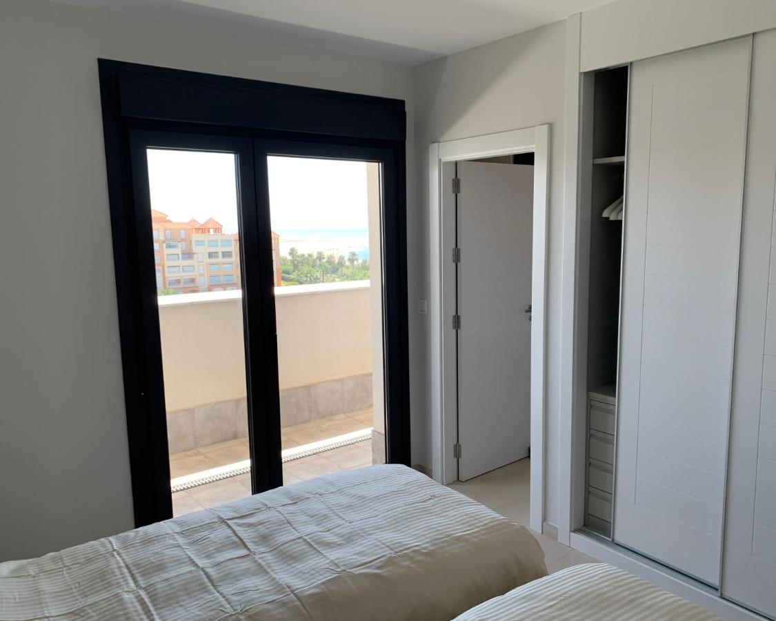 Apartamento Penthouse With Wide Terrace Next To The Ocean Huelva Exterior foto